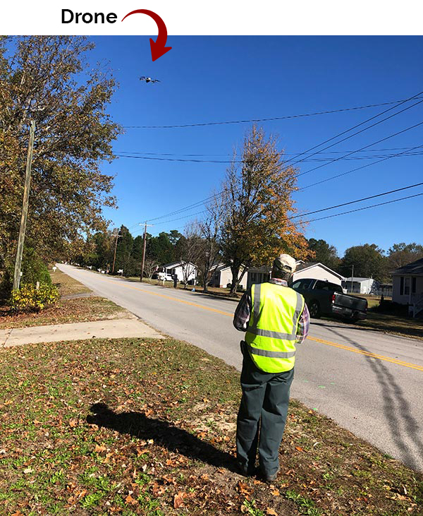 Accident Recontruction Engineer Drone Inpection with arrow